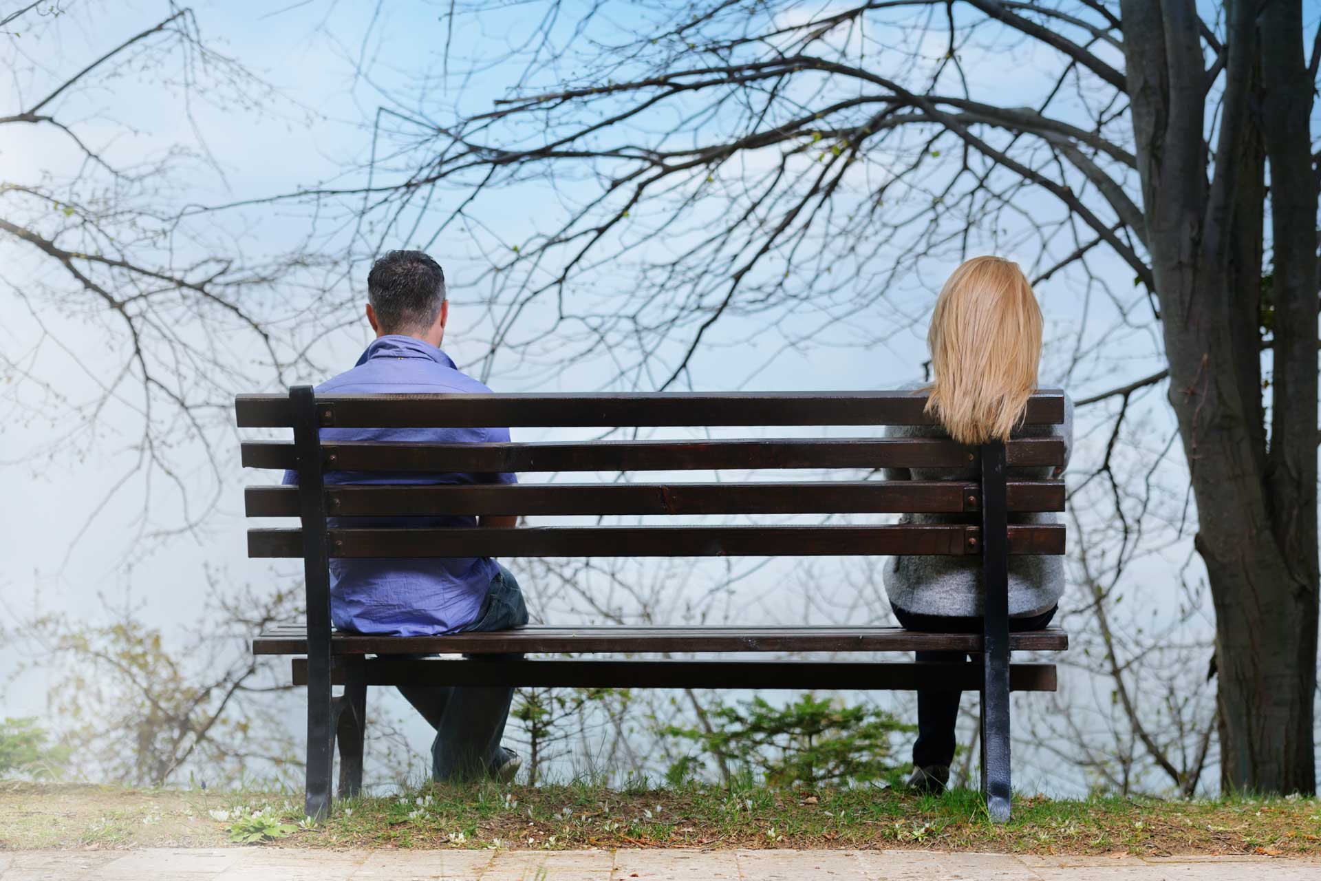 Couple reflecting on separation and future decisions with support from divorce mediation services